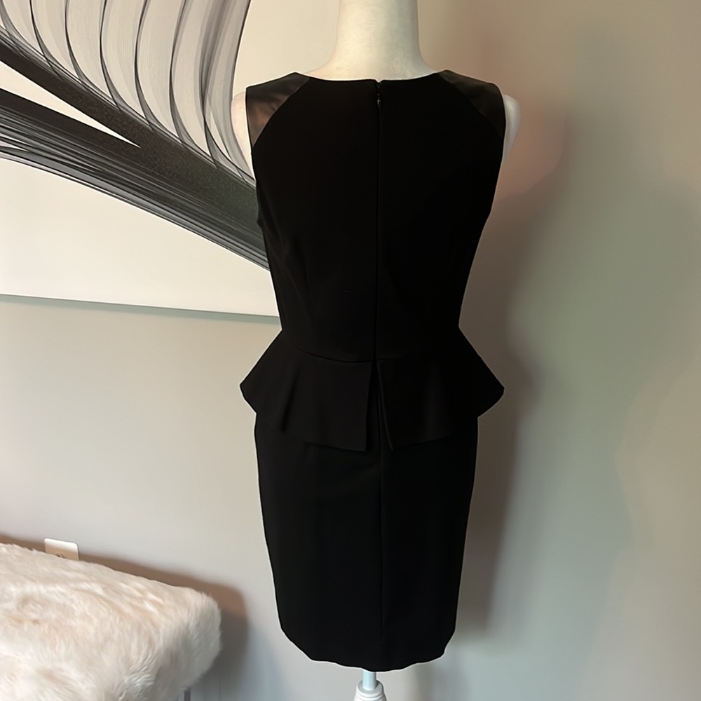Vince Camuto Faux Leather Shoulder Black Sleeveless Peplum Sheath Dress - Picture 9 of 9